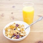 15794209-breakfast-cereal-with-a-glass-of-orange-juice